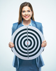 Young business woman holding target.