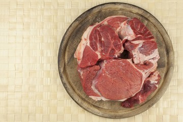 Raw beef shin. Preparing meat for cooking. Background for creating the menu.
