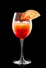 Colourful cocktail on the black background