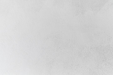 Concrete wall with white stucco relief, background