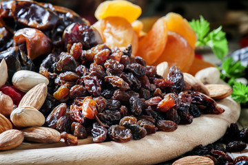 Raisins, dried grapes, dried fruit and nut mix, selective focus