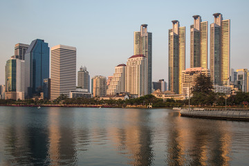 Fototapeta na wymiar City, urban and lake at evening time.