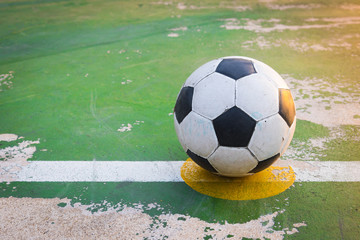 old ball at kick off point in court