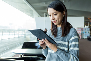 Asian woman look at digital tablet