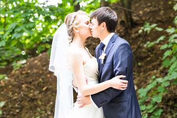 Wedding, Beautiful Romantic Bride and Groom Kissing 