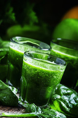 Healthy green smoothie from spinach and green apples, selective