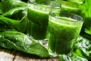 Healthy green smoothie from spinach and green apples, selective