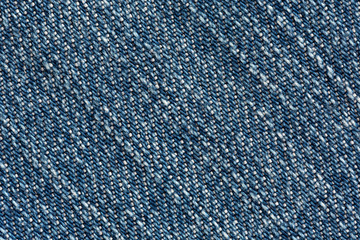 Blue Denim Texture close up diagonal Direction of Threads
