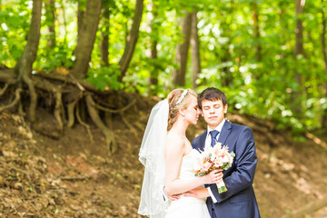 Wedding, Beautiful Romantic Bride and Groom Embracing 