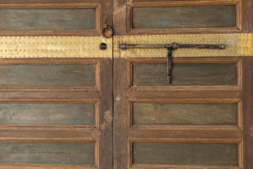door and lock in the 19th century Bahia Palace in Marrakech