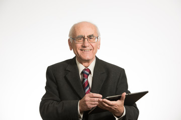 old businessman with tablet computer