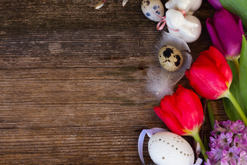 Spring flowers with easter eggs