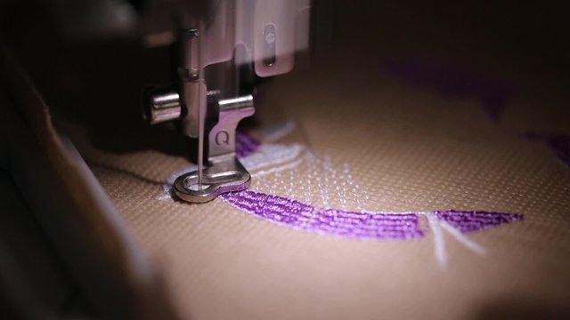 Close- up of machine embroidery working