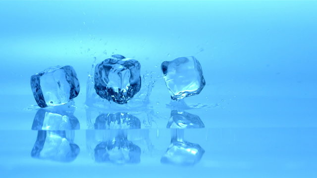 Ice cubes splashing, slow motion