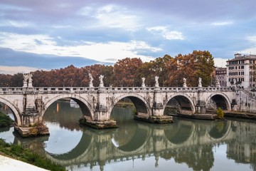 Obraz premium view of the saint'angelo bridge side, of rome - cultural and architectural concept