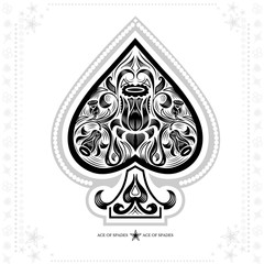 ace of spades with flower pattern inside. black in white