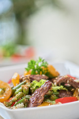 Warm salad with veal