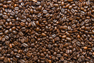 Roasted coffee beans background texture.