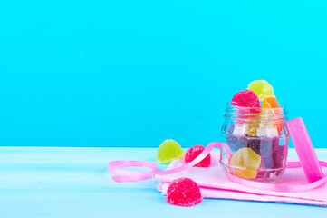 Colored sweets. candy and jelly on a bright background. marmalade of different colors on a bright background for the holidays and birthdays.