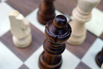 wooden chess pawns close up