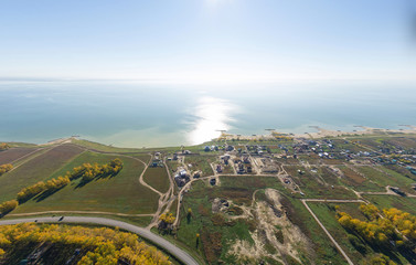 Aerial view of a summer house village at blue sea coast.