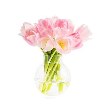 Bouquet of pink flowers in vase isolated over white background