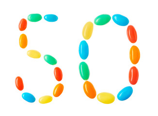 50 number made of multicolored candies isolated on white