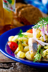 herring ,pasta and tomatoes  salad.