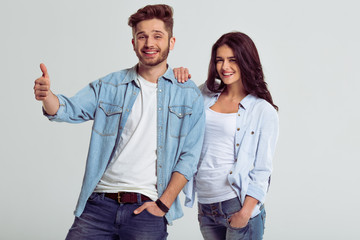 Fototapeta premium Beautiful young couple in jeans