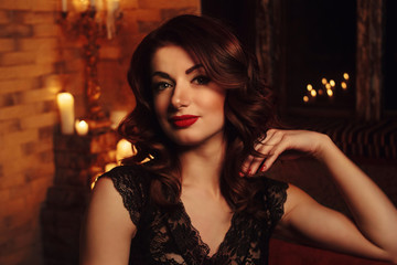 sexy brunette with evening candlelight