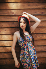 Fototapeta premium beautiful girl poses for camera in the city