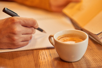 Pleasant man making notes