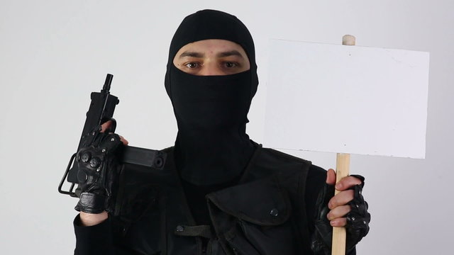 Terrorist with gun and sign on white background
