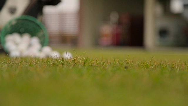 Slashing at the ball in a golf closeup.