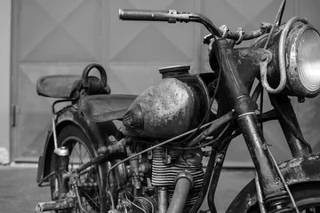 Gartenposter Photoshoot of old rusty vintage motorcycle © pasicevo
