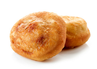 two meat pies belyashi on white background