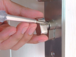 Door repairing. Close-up of repairing door