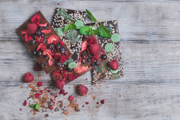 Tiles of a broken exquisite hand-made chocolate