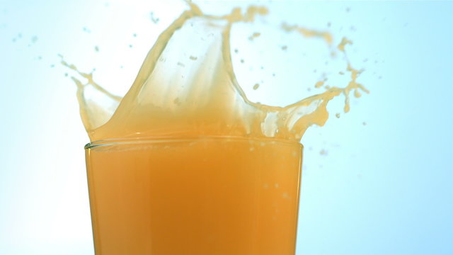 Orange juice splash, slow motion
