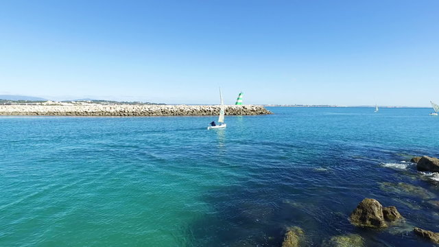 Sailing in the harbor from Lagos in the Algarve Portugal
