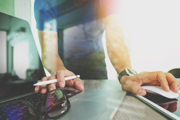 Website designer working digital tablet and smartphone and digit