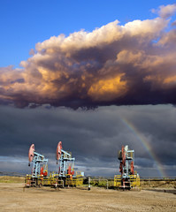Obraz premium Rainbow and oil pumps 