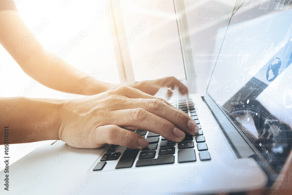 Poster designer moving hands working with laptop computer and digital w