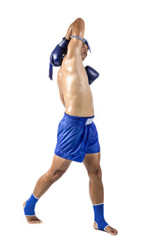 a thai boxer with thai boxing action, isolated on white background
