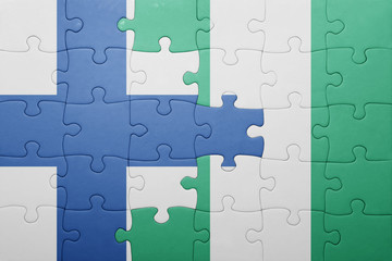 puzzle with the national flag of finland and nigeria