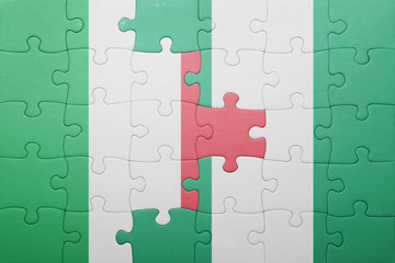 puzzle with the national flag of italy and nigeria