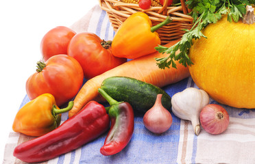 Vegetables on tablecloth.