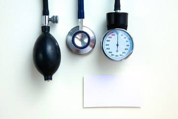 Closeup portrait of a  doctor with stethoscope holding folder