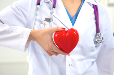 Close-up of unknown female doctor with stethoscope isolated