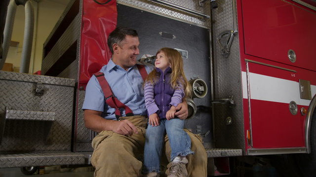 Firefighter with girl